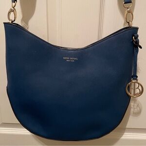 Henri Bendel West 57th
Crossbody Hobo bag in blue Saffiano leather